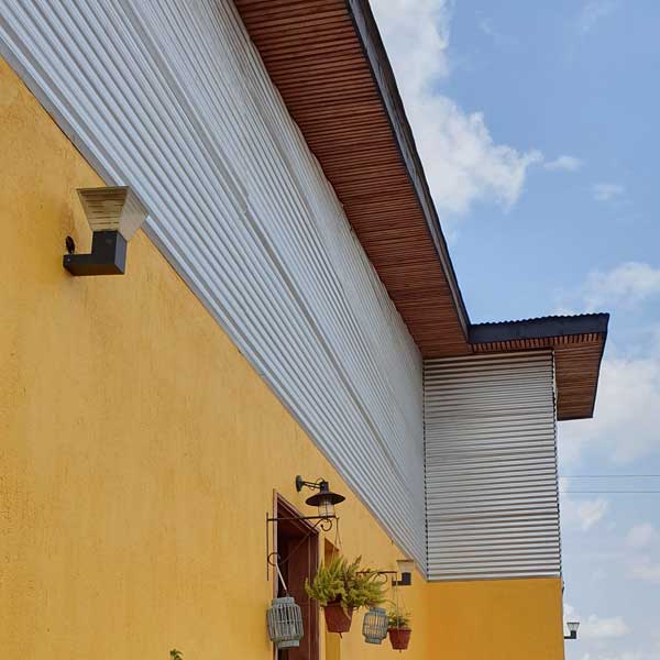 below shot of roof with iron sheets